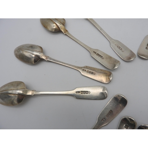 523 - A COLLECTION OF FOURTEEN SILVER FIDDLE TEA SPOONS, some with rat tail pattern, all with either Dubli... 