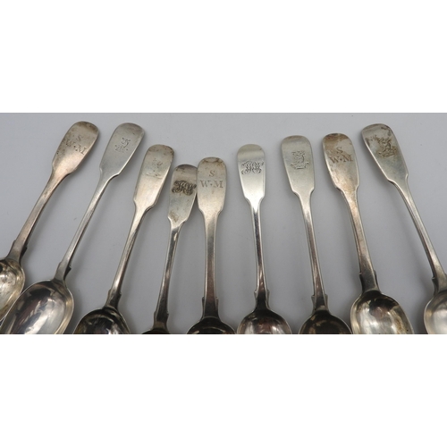 500 - A COLLECTION OF NINE 19TH CENTURY SILVER FIDDLE TEA SPOONS, engraved with crests and monograms, vari... 