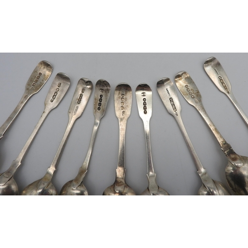 500 - A COLLECTION OF NINE 19TH CENTURY SILVER FIDDLE TEA SPOONS, engraved with crests and monograms, vari... 