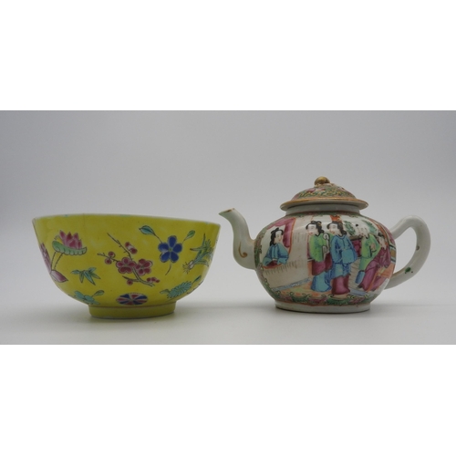 232 - A CHINESE FAMILLE ROSE TEA POT AND A YELLOW GROUND FAMILLE ROSE BOWL, the teapot profusely decorated... 