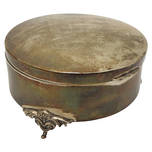 484 - A SILVER CIRCULAR RING BOX, raised on three scroll foliate feet, bears the mark William Hutton &... 