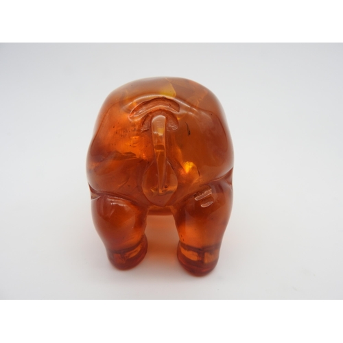 318 - A CARVED FIGURE OF HIPPOPOTAMUS, 6 x 12.5 cm