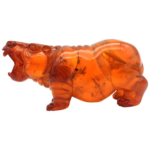 318 - A CARVED FIGURE OF HIPPOPOTAMUS, 6 x 12.5 cm