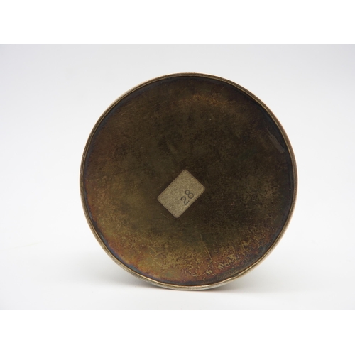 431 - A 19TH CENTURY CIRCULAR WHITE METAL SNUFF POT, the glazed lid inset with a gilt metal relief panel d... 