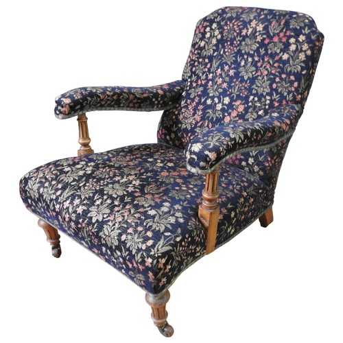 89 - ATTRIBUTED TO HOWARD & SONS, A WALNUT FRAMED ARMCHAIR, late 19th/ early 20th century, the back l... 