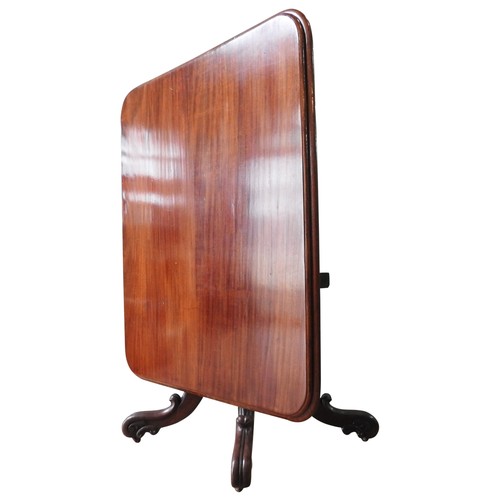 5 - A 19TH CENTURY MAHOGANY TILT-TOP BREAKFAST TABLE, a moulded oblong top on a turned pedestal base wit... 