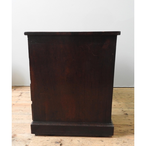 69 - A 19TH CENTURY MAHOGANY WRITING DESK, with leather inset top, a long frieze drawer flanked by two ba... 