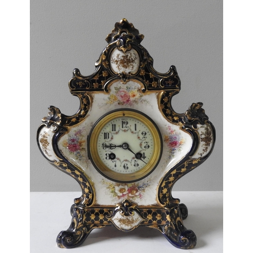 175 - A ROYAL BONN PORCELAIN MANTEL CLOCKCIRCA 1900of bombe-form the sides decorated with brightly coloure... 