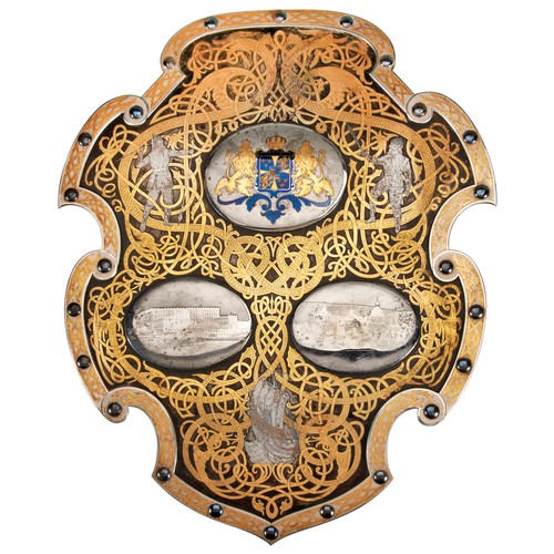 597 - A GOOD SWEDISH STEEL SHIELD-SHAPED WALL PLAQUE, a raised cartouche with the Swedish Coat of Arms ove... 