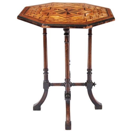 41 - A VICTORIAN OCTAGONAL PARQUETRY LAMP TABLE, circa 1890, geometric starburst pattern top raised on fo... 