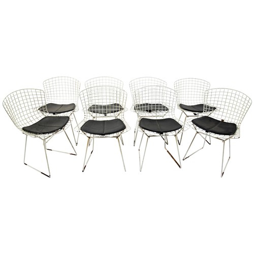 101 - A SET OF EIGHT VINTAGE DINING CHAIRS BY HARRY BERTOIA FOR KNOLL, designed 1952,  white coated steel ... 