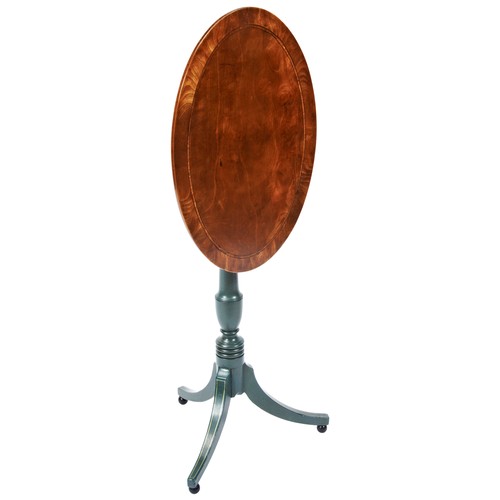 22 - A REGENCY SATINWOOD AND PAINTED OVAL TILT-TOP WINE TABLECIRCA 1820the oval top tilt-top raised on a ... 