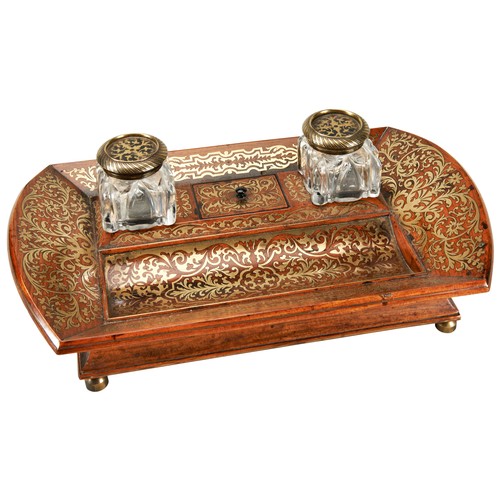 438 - A FINE BOULLE WORK INKWELL STAND19TH CENTURYthe bombe oblong stand inlaid with scrolling foliage thr... 