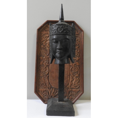 196 - A CARVED WOODEN BUST OF BODHISATTVA, 20th century, raised on a simplistic stand with square plinth b... 