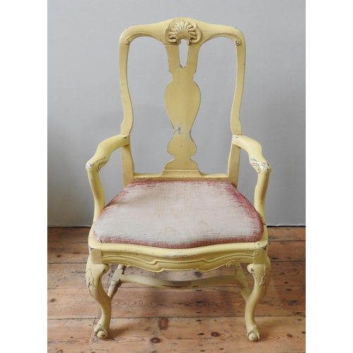 9 - A QUEEN ANNE STYLE ELBOW CHAIR, with pierced vasiform splat and scroll arms, the cabriole legs unite... 