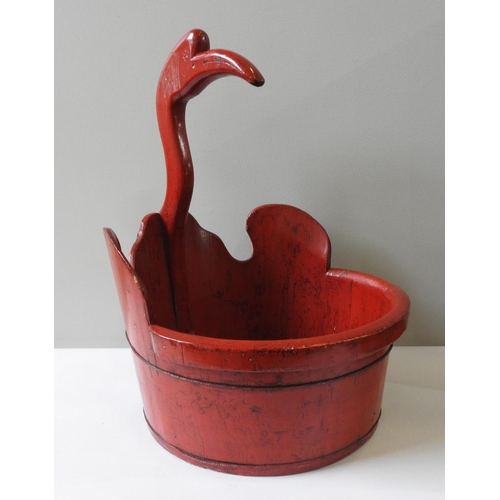 137 - A JAPANESE WOODEN BUCKET, tapered circular shape,in the form of a crane, crimson painted, 56 cm high... 