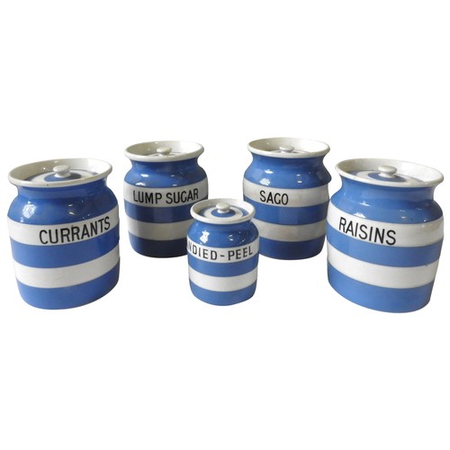 246 - FOUR CORNISHWARE STORAGE JARS BY GREEN & CO LTD, blue and white banded, 16 cm high, along with a... 