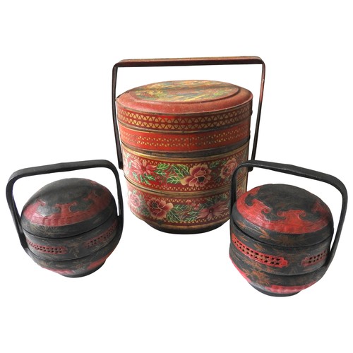 426 - A CHINESE TIN LUNCH CONTAINER AND A PAIR OF PAINTED WICKER LUNCH CONTAINERS, the tin container in th... 