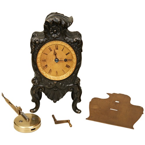 184 - AN ENGLISH BRONZE MANTEL TIMEPIECE, circa 1840, machined gilt dial with trefoil hands, single train ... 