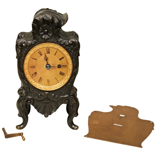 184 - AN ENGLISH BRONZE MANTEL TIMEPIECE, circa 1840, machined gilt dial with trefoil hands, single train ... 