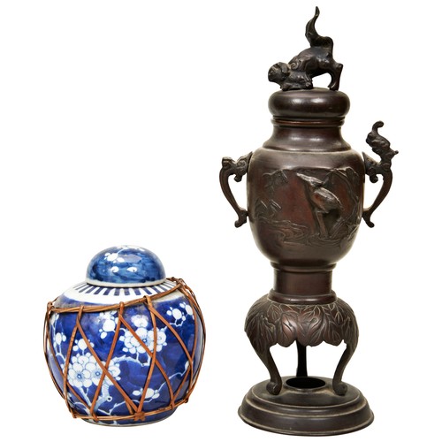 199 - A CHINESE BRONZE INCENSE BURNER AND A GINGER JAR, the incense burner of baluster form with two handl... 