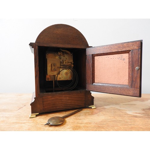 176 - AN OAK BRACKET CLOCK, brass dial with silvered chapter ring, Roman & Arabic numerals with subsid... 