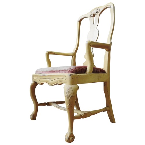 9 - A QUEEN ANNE STYLE ELBOW CHAIR, with pierced vasiform splat and scroll arms, the cabriole legs unite... 
