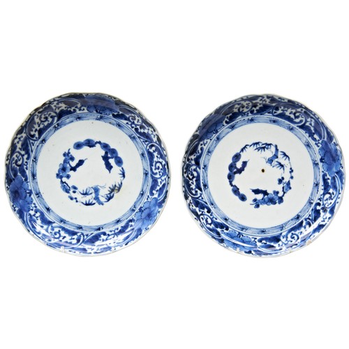 260 - PAIR OF JAPANESE ARITA BLUE AND WHITE DISHESEDO PERIOD, 17TH CENTURYdecorated with the three friends... 