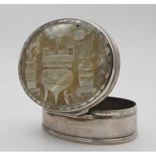 425 - A LATE 19TH CENTURY SILVER AND MOTHER OF PEARL BOX, oval form, the hinged cover inset with carved mo... 