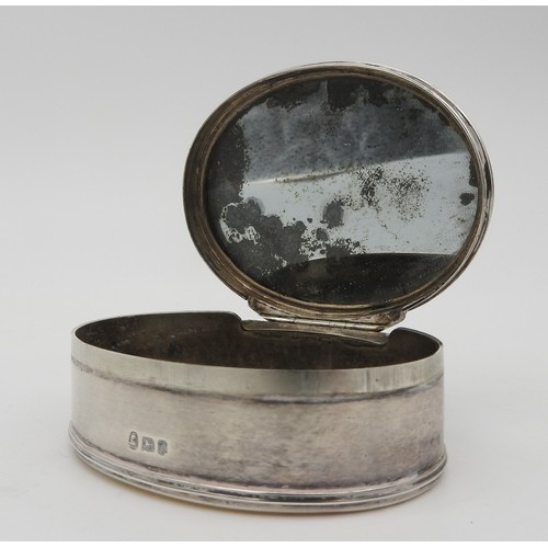 425 - A LATE 19TH CENTURY SILVER AND MOTHER OF PEARL BOX, oval form, the hinged cover inset with carved mo... 