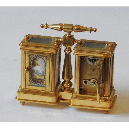 123 - A FRENCH STYLE DOUBLE CARRIAGE CLOCK / BAROMETER, brass body inset with landscape decorated porcelai... 