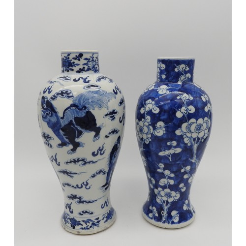 251 - TWO CHINESE BLUE & WHITE BALUSTER VASES, late Qing Dynasty, each bearing apocryphal Kangxi four ... 