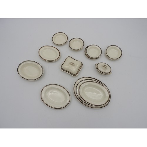 373 - A COLLECTION OF VINTAGE MINIATURE DINNER WARE, cream glazed with concentric border pattern, comprisi... 