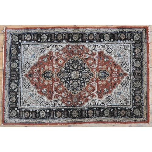 66 - A PERSIAN PART SILK RUG, with stylised floral decoration134 x 91 cm