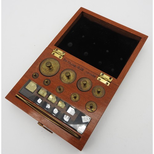 115 - A SET OF VINTAGE ANALYTICAL WEIGHTS AND BRASS APOTHECARY SCALES, the weights in their original box s... 