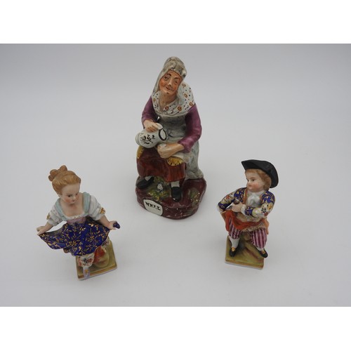 371A - A 19TH CENTURY STAFFORDSHIRE FIGURE, depicting Nell, the Cobbler's Wife, along with two 19th century... 