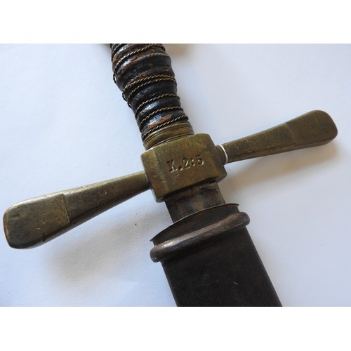 98 - A THEATRICAL REPLICA OF A GERMAN SWORD, cruciform hilt stamped 'K.2:5', with leather and metal wire ... 