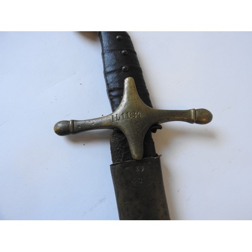 106 - A THEATRICAL REPLICA OF A PERSIAN SHAMSHIR SWORD, studded leather grip, right angled pommel, in a le... 