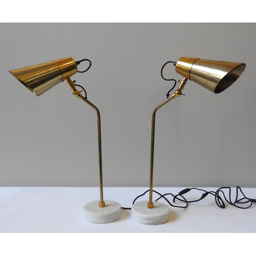 84 - A PAIR OF POLS POTTEN TABLE LAMPS, adjustable angle brass fittings on a circular marble base, 60 cm ... 