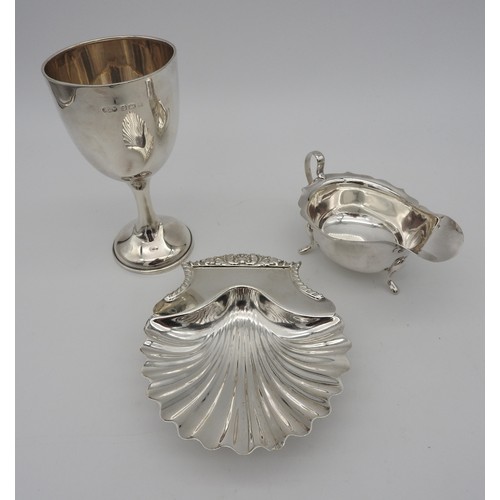 424 - A SILVER GOBLET, SILVER ENTRE DISH AND A SILVER SAUCEBOAT, the goblet of simplistic form (16 cm high... 