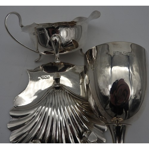 424 - A SILVER GOBLET, SILVER ENTRE DISH AND A SILVER SAUCEBOAT, the goblet of simplistic form (16 cm high... 