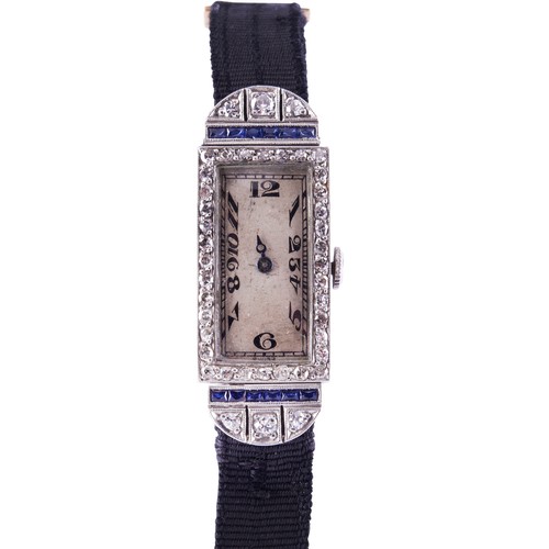 151 - FERRERO SA. A LADIES PLATINUM DIAMOND SET COCKTAIL WATCHsilvered rectangular dial with Arabic numera... 