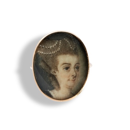 161 - A GEORGIAN PORTRAIT MINIATURE RING, CIRCA 1880depicting a lady, her hair dressed with pearls. Possib... 