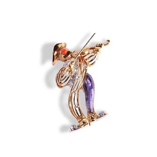 143 - AN AMETHYST, DIAMOND AND CORAL NOVELTY BROOCH, CIRCA 1960modelled as a musician playing a violin, on... 