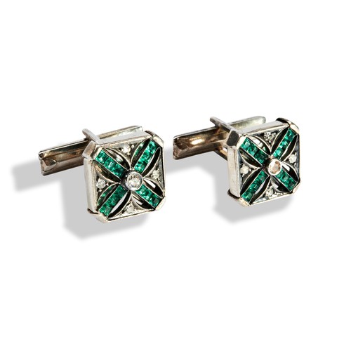 85 - A PAIR OF DIAMOND AND GREEN PASTE CUFFLINKS the central brilliant- cut diamond above a cross of squa... 