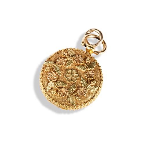 157 - A 19TH CENTURY TRICOLOUR GOLD ROUND LOCKET CIRCA 1840with applied gold flowers and leaves, hinged to... 