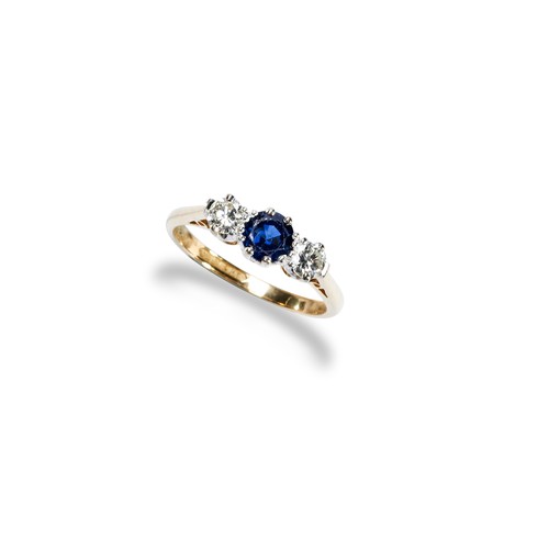 66 - A SAPPHIRE AND DIAMOND THREE STONE RINGthe central round cut, claw set, sapphire being flanked by tw... 