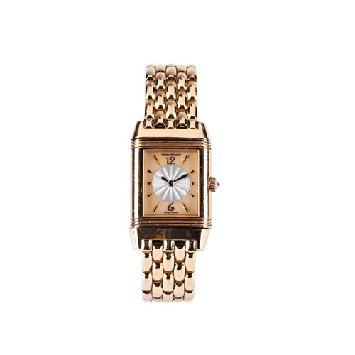 170 - JAEGER LE COULTRE: AN 18CT YELLOW GOLD AND DIAMOND SET LADIES DUETTO REVERSO WRISTWATCHref. 266.2.44... 