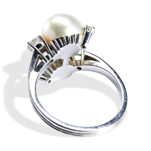 75 - A CULTURED PEARL & DIAMOND RING BY GUBELINtwo cultured pearls in a cross over setting, with claw... 