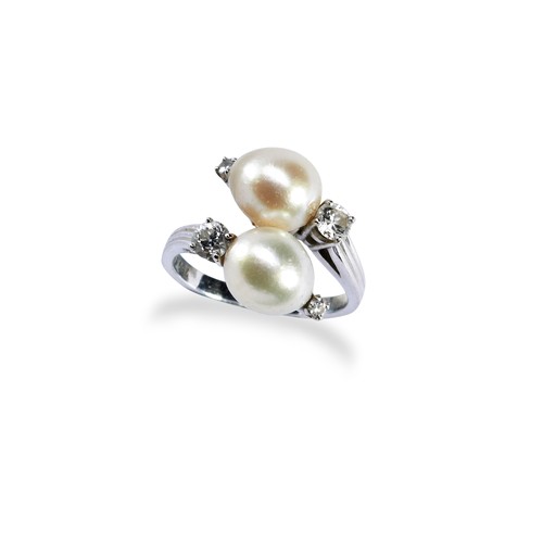 75 - A CULTURED PEARL & DIAMOND RING BY GUBELINtwo cultured pearls in a cross over setting, with claw... 